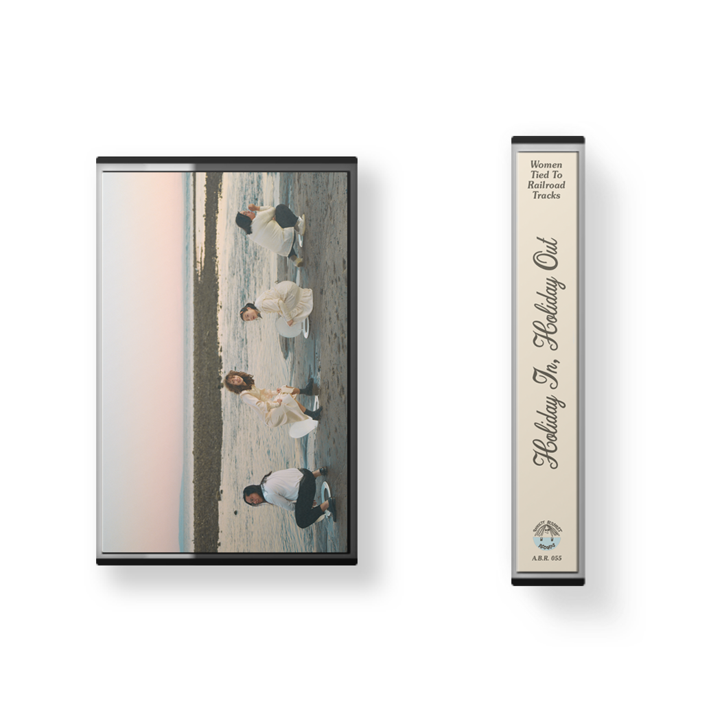 Women Tied To Railroad Tracks - “Holiday In, Holiday Out” Cassette Tape